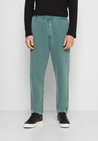 oftt Tracksuit trousers Fade Out green